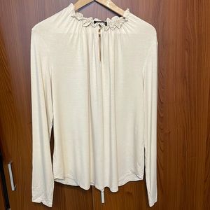 Long sleeve soft knit top with gathered neck